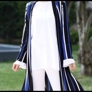 Long cardigan/duster with side slits .